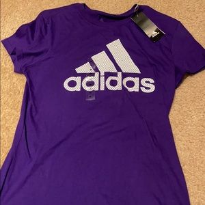 Purple adidas tshirt.